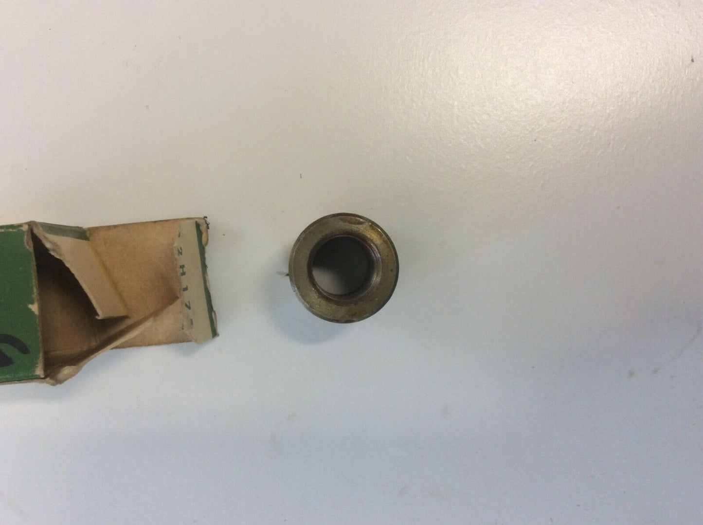 T14128 John Deere NOS Bushing Block On The Power Steering Line For 2010