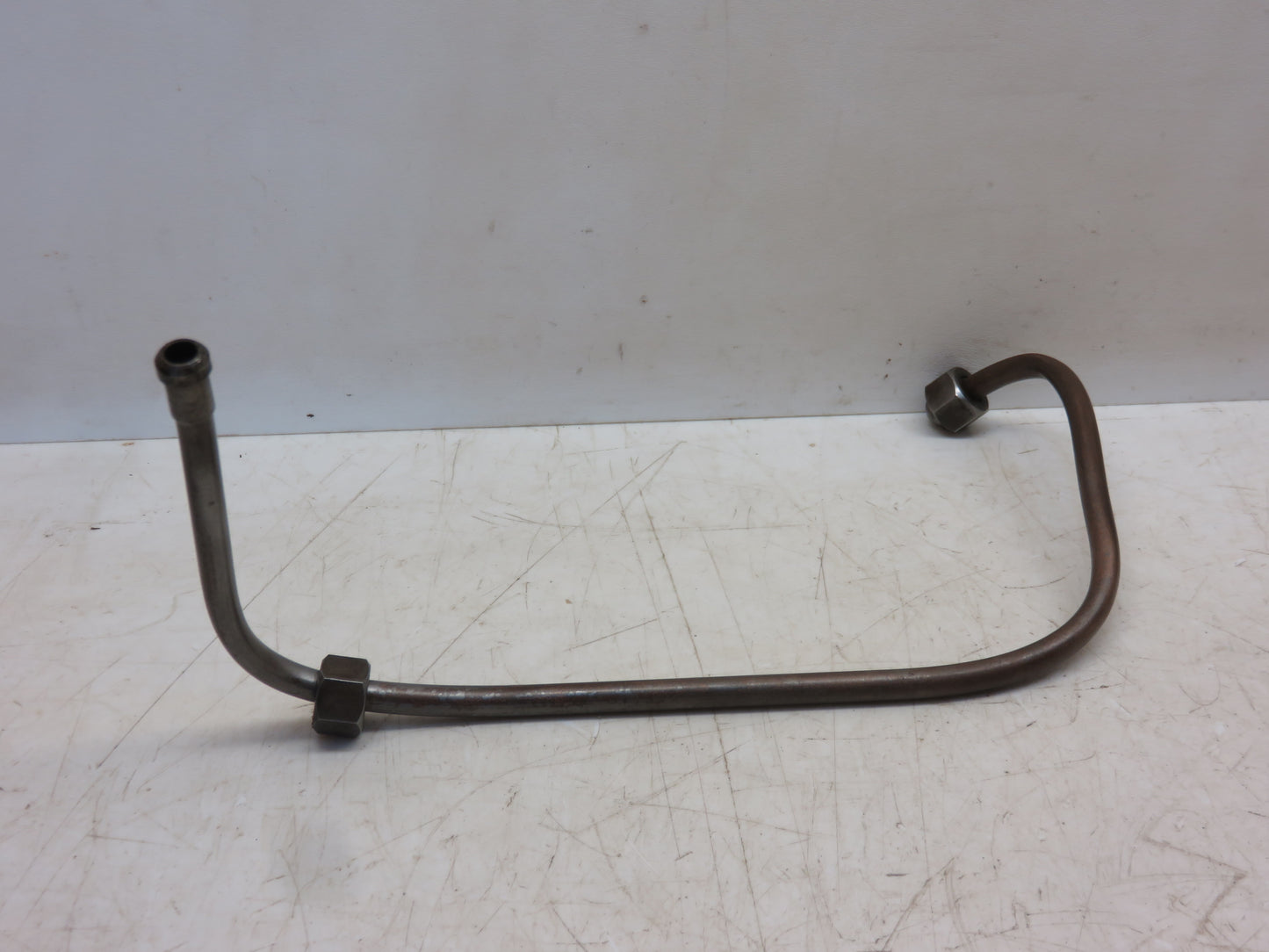 AF264R John Deere Left Hand Main Bearing Oil Line For G