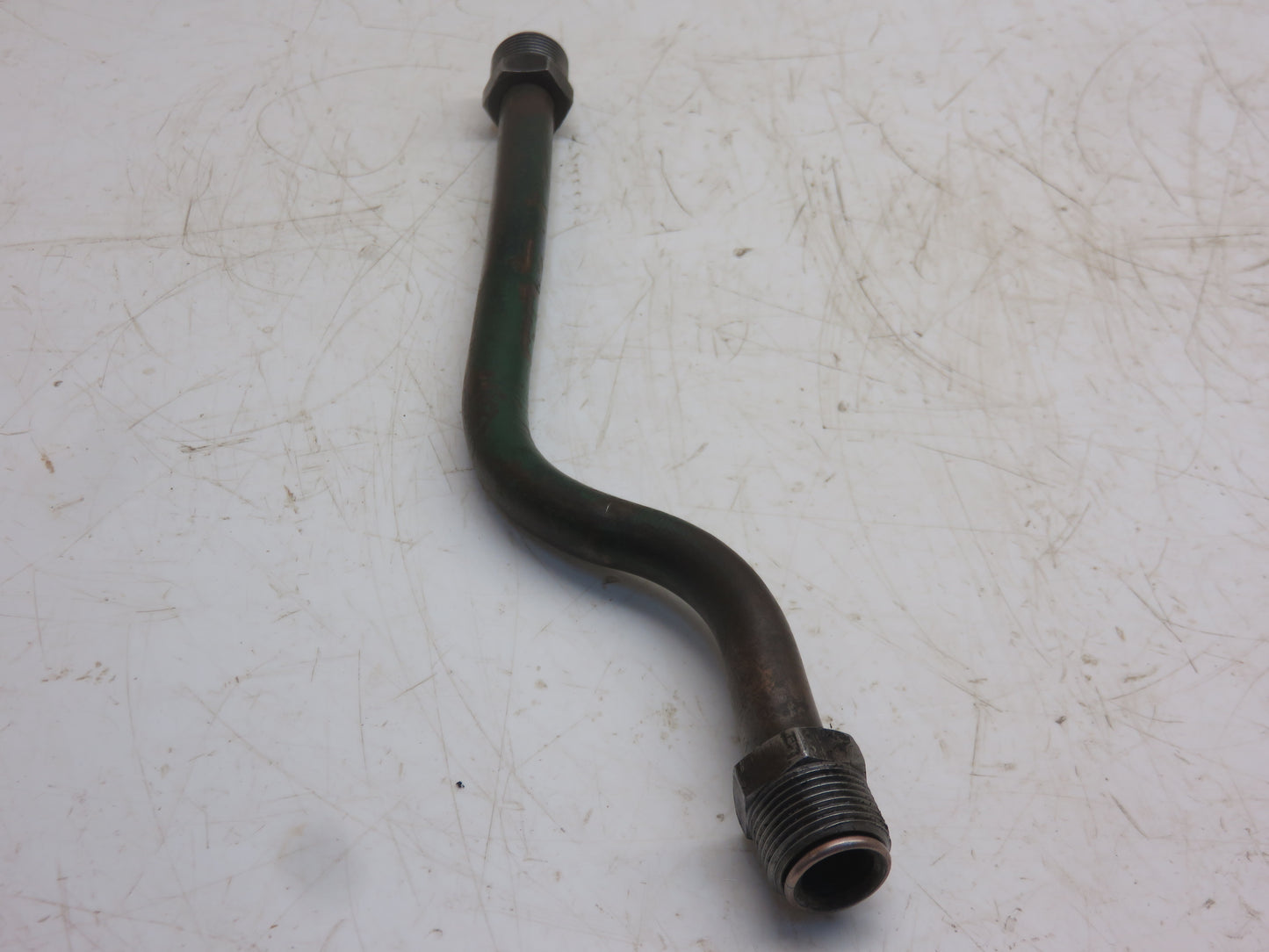 AT11579T John Deere Front Pump Outlet Line For 435
